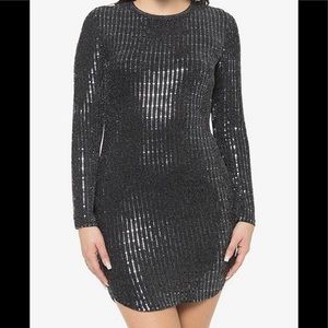 Black long sleeve dress with metallic detail